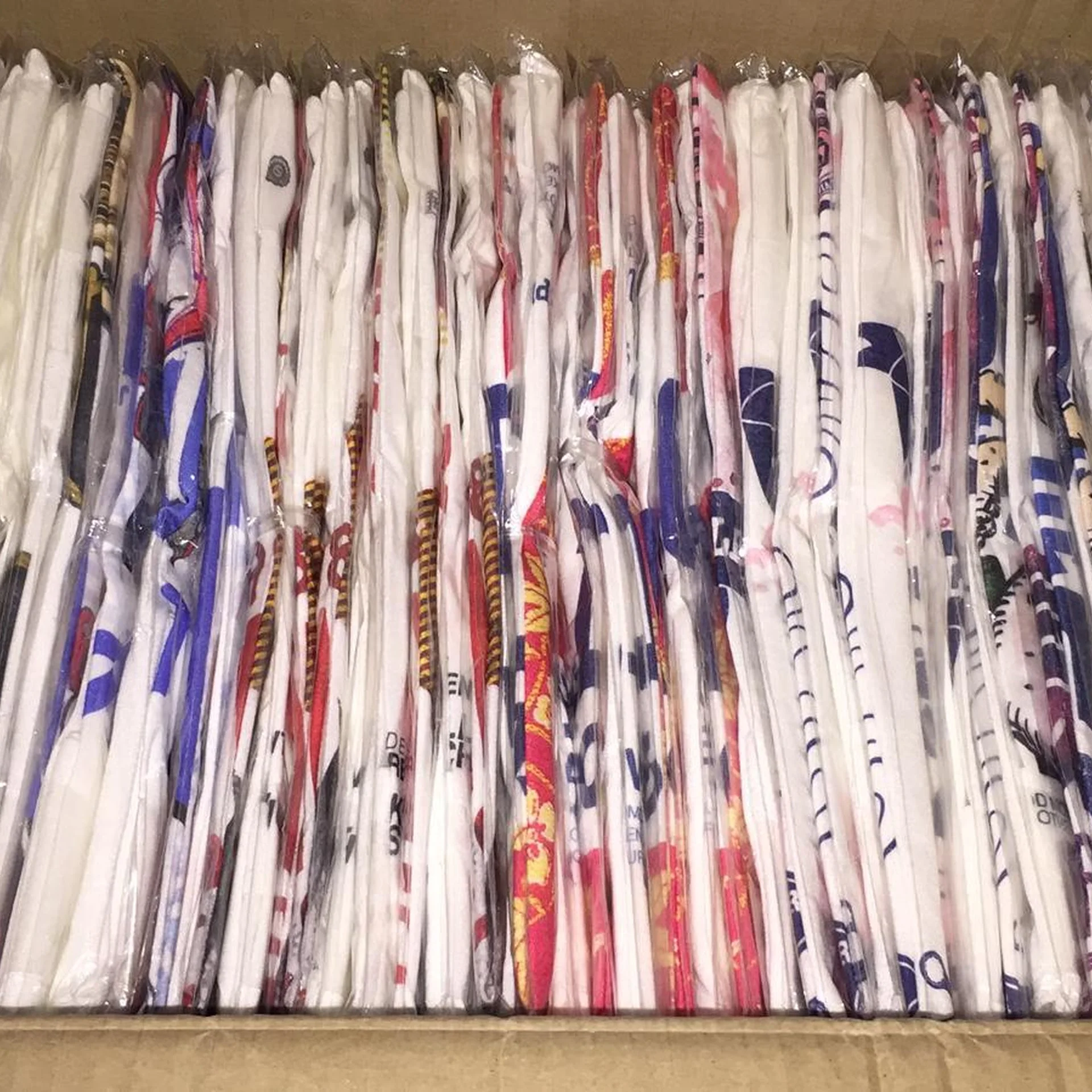 Packed Oldskull shirts standing in a shipping box