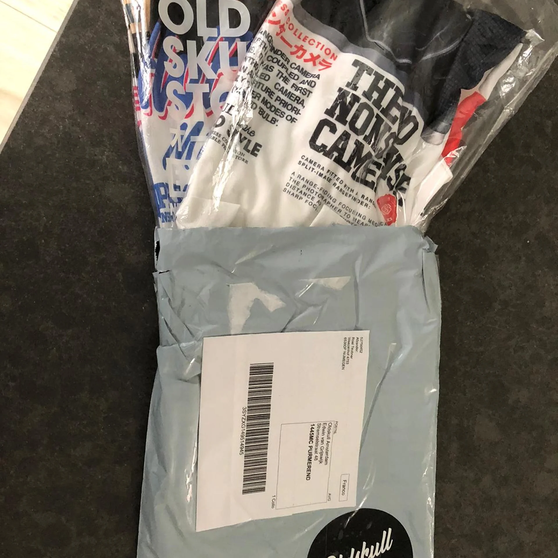 Packed Oldskull mailer with shirts ready to ship