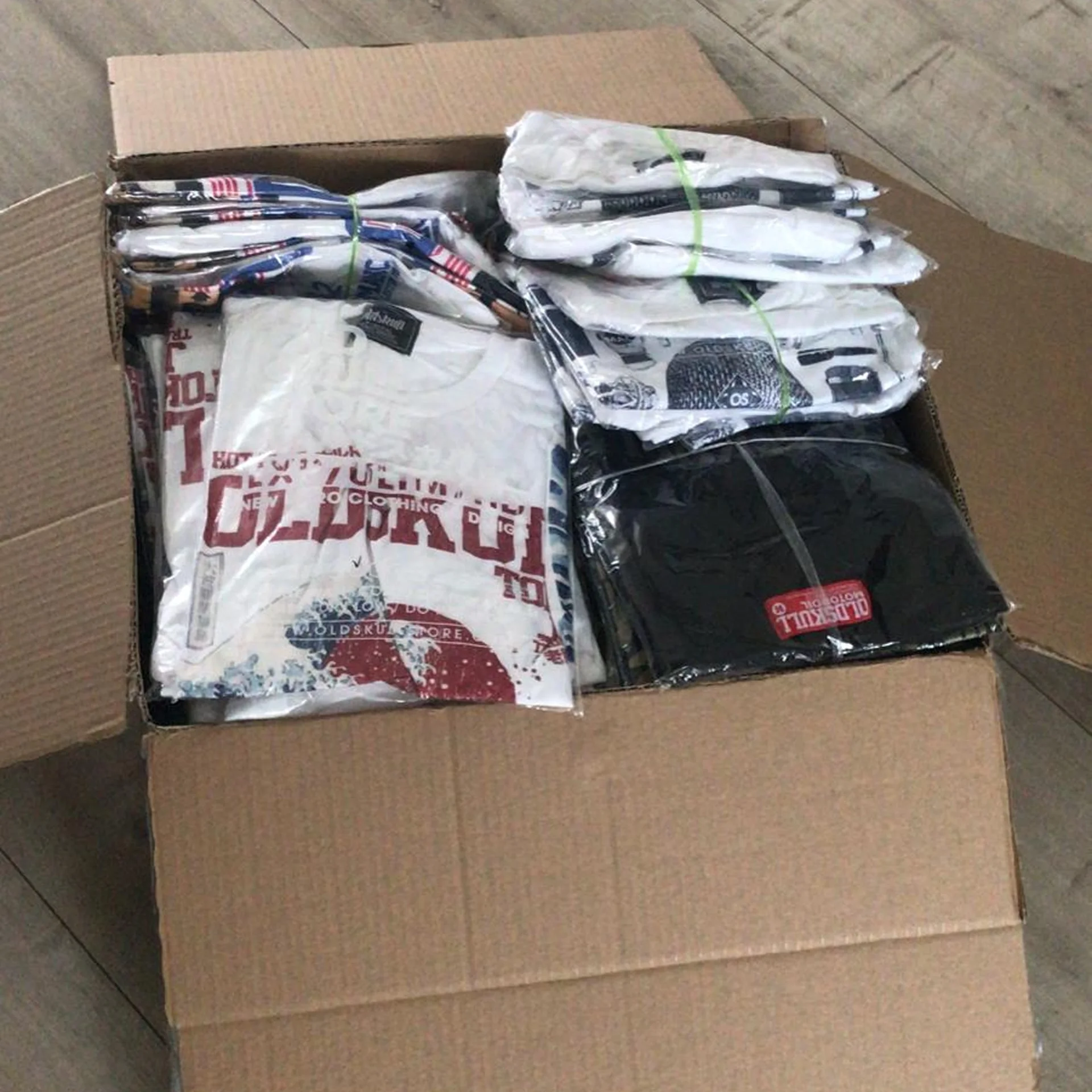 Open carton of incoming Oldskull stock